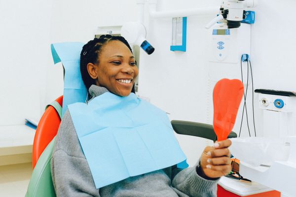 Smiling patient at a dental check-up at Dental and Aesthetic by Dr. Mavleen, Kharghar